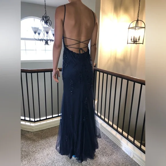 Size 6 Faviana’s dress from Atatiana’s